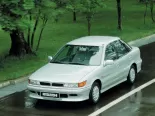 Mitsubishi Lancer (C62A, C64A, C66A, C68A, C77A) 6 поколение, лифтбек (1988 - 1991)