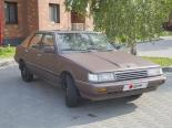 Toyota Camry (CV10, CV11, SV10, SV11) 1 поколение, рестайлинг, лифтбек (1984 - 1986)